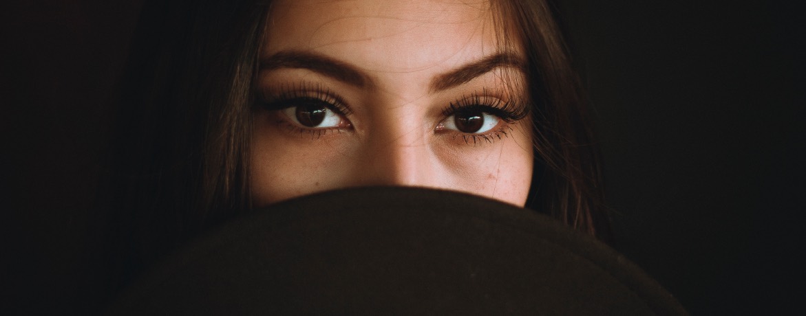 woman with a veiled face